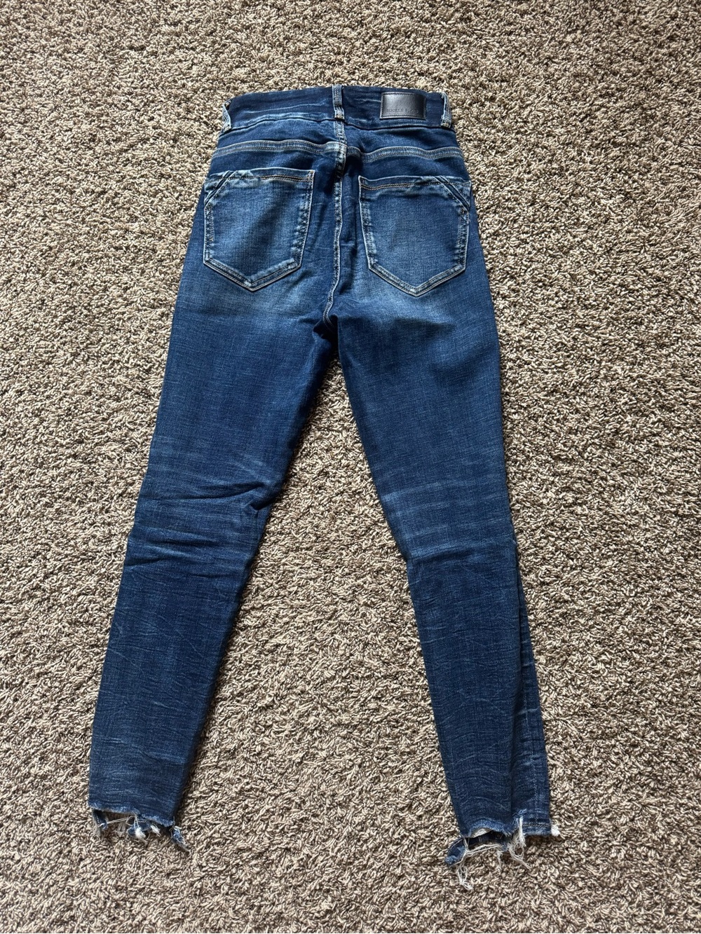 Women’s buckle black jeans